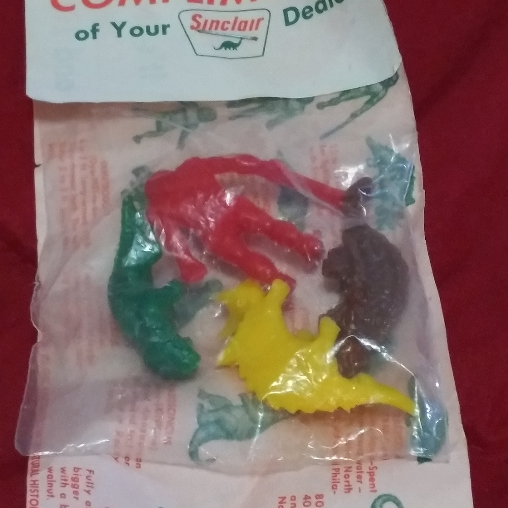 Vintage Sinclair dinosaur packs